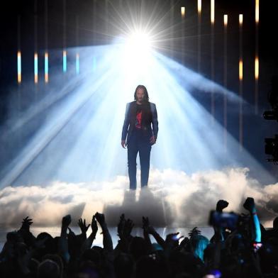 Canadian-US actor Keanu Reeves announces the new video game "Cyberpunk 2077" at the Microsoft Xbox press event ahead of the E3 gaming convention in Los Angeles on June 9, 2019. (Photo by Mark RALSTON / AFP)