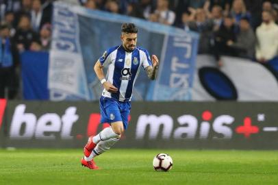  Porto's Brazilian defender Alex Telles celebrates a goal during the UEFA Champions League round of 16 second leg football match between FC Porto and AS Roma at the Dragao stadium in Porto on March 6, 2019. 