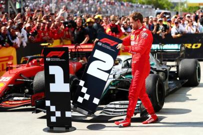 F1 Grand Prix of CanadaMONTREAL, QC - JUNE 09: Second placed Sebastian Vettel of Germany and Ferrari swaps the number boards at parc ferme during the F1 Grand Prix of Canada at Circuit Gilles Villeneuve on June 09, 2019 in Montreal, Canada.   Dan Istitene/Getty Images/AFPEditoria: SPOLocal: MontrealIndexador: Dan IstiteneSecao: Motor RacingFonte: GETTY IMAGES NORTH AMERICAFotógrafo: STF