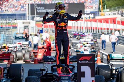 Red Bulls Dutch driver Max Verstappen reacts after winning the Austrian Formula One Grand Prix in Spielberg on June 30, 2019. (Photo by ANDREJ ISAKOVIC / AFP)