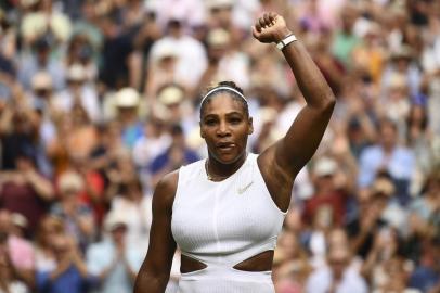 US player Serena Williams celebrates beating US player Alison Riske during their womens singles quarter-final match on day eight of the 2019 Wimbledon Championships at The All England Lawn Tennis Club in Wimbledon, southwest London, on July 9, 2019. (Photo by Daniel LEAL-OLIVAS / AFP) / RESTRICTED TO EDITORIAL USE