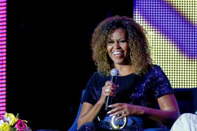 NEW ORLEANS, LOUISIANA - JULY 06: Michelle Obama and Gayle King speak onstage during the 2019 ESSENCE Festival Presented By Coca-Cola at Louisiana Superdome on July 06, 2019 in New Orleans, Louisiana.   Bennett Raglin/Getty Images for ESSENCE/AFP