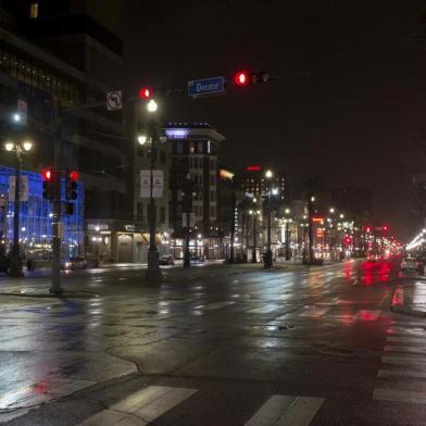 Canal Street is seen empty on Friday night in New Orleans, Louisiana July 12,2019 ahead of Tropical Storm Barry. - Barry is predicted to become a Category 1 hurricane before making landfall Saturday with maximum winds reaching 75 mph bringing with it heavy rain and possible storm surges. (Photo by Seth HERALD / AFP)