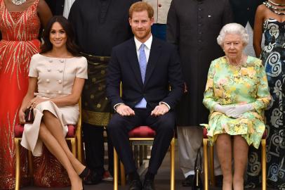 Meghan Markle, príncipe Harry e rainha Elizabeth II