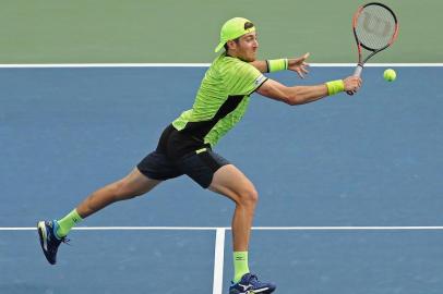 NEW YORK, NY - SEPTEMBER 03: Jamie Murray of Great Britain and Bruno Soares of Brazil in action during their men's doubles second round match against Marcelo Demoliner of Brazil and Marcus Daniell of New Zealand on Day Seven of the 2017 US Open at the USTA Billie Jean King National Tennis Center on September 3, 2017 in the Flushing neighborhood of the Queens borough of New York City.   Abbie Parr/Getty Images/AFP