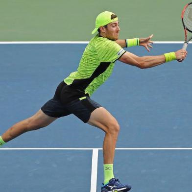 NEW YORK, NY - SEPTEMBER 03: Jamie Murray of Great Britain and Bruno Soares of Brazil in action during their mens doubles second round match against Marcelo Demoliner of Brazil and Marcus Daniell of New Zealand on Day Seven of the 2017 US Open at the USTA Billie Jean King National Tennis Center on September 3, 2017 in the Flushing neighborhood of the Queens borough of New York City.   Abbie Parr/Getty Images/AFP