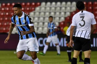  Brazils Gremio players celebrate after scoring against Paraguays Libertad during a Copa Libertadores football match at Defensores del Chaco Stadium in Asuncion, on August 1, 2019. (Photo by NORBERTO DUARTE / AFP)Editoria: SPOLocal: AsuncionIndexador: NORBERTO DUARTESecao: soccerFonte: AFPFotógrafo: STR