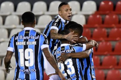  Brazil's Gremio players celebrate after scoring against Paraguay's Libertad during a Copa Libertadores football match at Defensores del Chaco Stadium in Asuncion, on August 1, 2019. (Photo by NORBERTO DUARTE / AFP)Editoria: SPOLocal: AsuncionIndexador: NORBERTO DUARTESecao: soccerFonte: AFPFotógrafo: STR