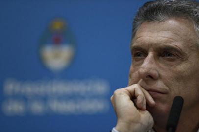 Data: 12/08/2019Argentinas President Mauricio Macri offers a press conference at Casa Rosada Presidential Palace in Buenos Aires on August 12, 2019 a day after primary elections. - Argentinas currency lost almost 19 percent of its value against the dollar on Monday after pro-business President Mauricio Macri suffered a crushing defeat in party primaries over the weekend. (Photo by Juan MABROMATA / AFP)