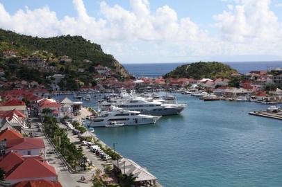 Harborside Gustavia is the capital of St. Barts.ST. BARTS â BC-TRAVEL-TIMES-36-ST-BARTS-ART-NYTSF â Harborside Gustavia is the capital of St. Barts. Too rugged for large-scale agriculture, the longtime French possession was a colonial afterthought, flipped to Sweden in 1784 for trading privileges in the port of Gothenburg. Returned to France nearly a century later, the island is more Marseille than Malmo, with the ruins of Fort Gustaf overlooking the main harbor among the few reminders of the islandâs Scandinavian past. (CREDIT: Danielle La Rocco/The New York Times)âONLY FOR USE WITH ARTICLE SLUGGED -- BC-TRAVEL-TIMES-36-ST-BARTS-ART-NYTSF -- OTHER USE PROHIBITED.Editoria: TRALocal: .Indexador: Danielle La RoccoFonte: NYTNSFotógrafo: STR