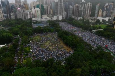 Protesters gather for a rally in Victoria Park in Hong Kong on August 18, 2019, in the latest opposition to a planned extradition law that has since morphed into a wider call for democratic rights in the semi-autonomous city. - Hong Kong democracy activists gathered August 18 for a major rally to show the citys leaders their protest movement still attracts wide public support despite mounting violence and increasingly stark warnings from Beijing. (Photo by Philip FONG / AFP)