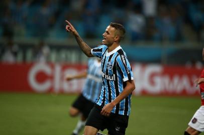  PORTO ALEGRE,BRASIL,RS - 26/03/2014 - Gauchão - Semifinal, Grêmio x Brasil-PEL na Arena.(FOTO:JEFFERSON BOTEGA/AGÊNCIA RBS)Jogador Luan faz o segundo gol do Grêmio.