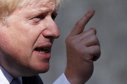 (FILES) In this file photo taken on July 24, 2019 Britains new Prime Minister Boris Johnson gives a speech outside 10 Downing Street in London, on the day he was formally appointed British prime minister. - British Prime Minister Boris Johnson announced August 28,  that the suspension of Britains parliament would be extended until October 14 -- just two weeks before the UK is set to leave the EU -- enraging anti-Brexit MPs. MPs will return to London later than in recent years, giving pro-EU lawmakers less time than expected to thwart Johnsons Brexit plans before Britain is due to leave the European Union on October 31. (Photo by Adrian DENNIS / AFP)