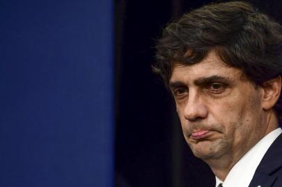 Argentinas Finance Minister Hernan Lacunza gestures during a press conference to announce new economic measures in Buenos Aires, on August 28, 2019. - The peso -- which lately lost 20 percent of its value as markets reacted to a crushing primary election defeat for Argentinas President Mauricio Macri -- showed no signs of a bounce. (Photo by RONALDO SCHEMIDT / AFP)