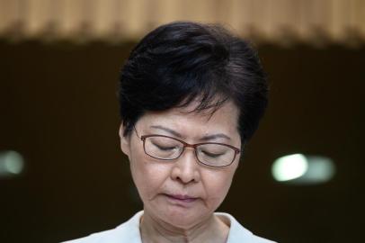 Hong Kong Chief Executive Carrie Lam waits for questions from the media at a press conference in Hong Kong on September 5, 2019, a day after she announced the withdrawal of a loathed extradition bill. - Hong Kongs leader on September 4 bowed to a key demand of pro-democracy protesters following three months of unrest, announcing the withdrawal of a loathed extradition bill, but activists vowed to press on with their campaign. (Photo by Philip FONG / AFP)