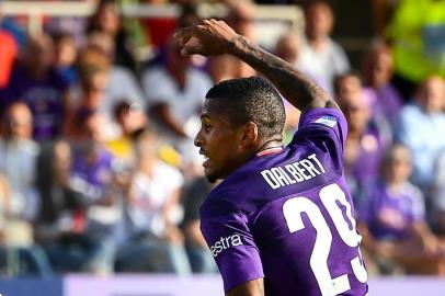 Juventus' Portuguese forward Cristiano Ronaldo falls after performing an overhead kick despite Fiorentina's Brazilian defender Dalbert (L) during the Italian Serie A football match Fiorentina vs Juventus on September 14, 2019 at the Artemio-Franchi stadium in Florence. (Photo by Vincenzo PINTO / AFP)