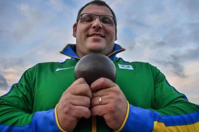  Brazilian Darlan Romani poses after a shot put training session at the Brazilian Athletics Confederation (CBAt) training centre in Braganca Paulista, some 88 km from Sao Paulo, Brazil on August 28, 2019. - Current number two in the world rankings, Brazilian Darlan Romani is among the favorites to win shot put gold medal in the upcoming Doha World Athletics Championships, which will be held from September 27 to October 6 at the Qatari capital. (Photo by NELSON ALMEIDA / AFP)Editoria: SPOLocal: Bragança PaulistaIndexador: NELSON ALMEIDASecao: shot putFonte: AFPFotógrafo: STF