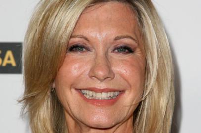 LOS ANGELES, CA - JANUARY 16:  Actress Olivia Newton-John arrives at the Australia Week 2010 Black Tie Gala on January 16, 2010 in Los Angeles, California.  (Photo by Valerie Macon/Getty Images)