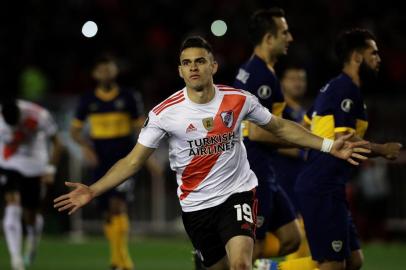 River Plates Colombian Rafael Santos Borre celebrates after scoring a penalty against Boca Juniors during their all-Argentine Copa Libertadores semi-final first leg football match at the Monumental stadium in Buenos Aires, on October 1, 2019. (Photo by Alejandro PAGNI / AFP)