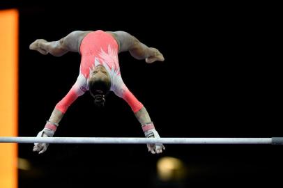  Brazils Flavia Saraiva performs on the uneven bars during the womens all-around final at the FIG Artistic Gymnastics World Championships at the Hanns-Martin-Schleyer-Halle in Stuttgart, southern Germany, on October 10, 2019. (Photo by Thomas KIENZLE / AFP)Editoria: SPOLocal: StuttgartIndexador: THOMAS KIENZLESecao: gymnasticsFonte: AFPFotógrafo: STR