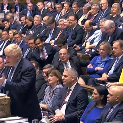 A video grab from footage broadcast by the UK Parliaments Parliamentary Recording Unit (PRU) shows Britains Prime Minister Boris Johnson responding to comments on his statement on a Brexit deal in the House of Commons in London on October 19, 2019. - British MPs gather Saturday for a historic vote on Prime Minister Boris Johnsons Brexit deal, a decision that could see the UK leave the EU this month or plunge the country into fresh uncertainty. (Photo by - / PRU / AFP) / RESTRICTED TO EDITORIAL USE - MANDATORY CREDIT  AFP PHOTO / PRU  - NO USE FOR ENTERTAINMENT, SATIRICAL, MARKETING OR ADVERTISING CAMPAIGNS