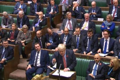 A video grab from footage broadcast by the UK Parliaments Parliamentary Recording Unit (PRU) shows Britains Prime Minister Boris Johnson speaking in the House of Commons in London on October 29, 2019, during a debate on the Early Parliamentary General Election Bill: Second Reading. - Britain looked set Tuesday for a pre-Christmas election after the main opposition Labour party backed Prime Minister Boris Johnsons push for an early vote to try to overcome the lengthening political deadlock caused by Brexit. Conservative leader Johnson -- overseeing a minority government -- is trying to lead Britain out of the deep crisis engulfing its EU departure that was meant to take place this Thursday. (Photo by HO / various sources / AFP) / RESTRICTED TO EDITORIAL USE - MANDATORY CREDIT  AFP PHOTO / PRU  - NO USE FOR ENTERTAINMENT, SATIRICAL, MARKETING OR ADVERTISING CAMPAIGNS