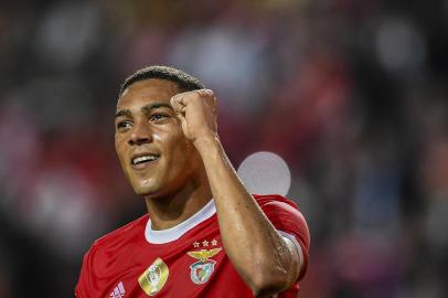 Benficas Brazilian forward Carlos Vinicius celebrates after scoring a goal during the Portuguese league football match between SL Benfica and Portimonense SC at the Luz stadium in Lisbon on October 30, 2019. (Photo by PATRICIA DE MELO MOREIRA / AFP)