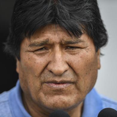 Bolivian ex-President Evo Morales delivers a speech upon his arrival in Mexico City, on November 12, 2019, where he was granted exile after his resignation. - Landlocked Bolivia, in crisis after its president quit amid protests over a disputed election, is among Latin Americas poorest countries despite having huge gas reserves. (Photo by PEDRO PARDO / AFP)