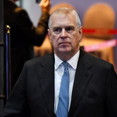 (FILES) In this file photo taken on November 03, 2019, Britains Prince Andrew, Duke of York arrives for the ASEAN Business and Investment Summit in Bangkok on November 3, 2019. - Britains Prince Andrew has said he does not remember meeting Virginia Roberts, one of disgraced US financier Jeffrey Epsteins alleged victims, who claims she was forced to have sex with the royal. But Andrew admitted in an interview with the BBC due to be broadcast on November 16, 2019, that his decision to remain friends with Epstein after he was convicted of soliciting prostitution from a minor was a serious error of judgement. (Photo by Lillian SUWANRUMPHA / AFP)