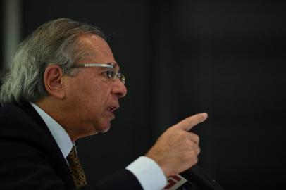 Brazil's Minister of Economy, Paulo Guedes, speaks during a press conference at the Embassy of Brazil in Washington, DC on November 25, 2019. (Photo by Olivier DOULIERY / AFP)