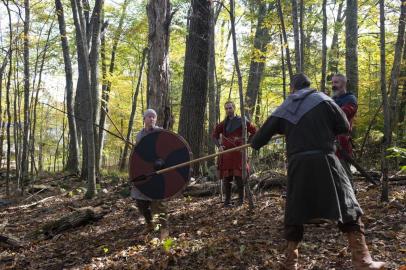 Mike and Blue fighting with spears