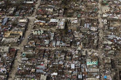 Hurricane Matthew in Jeremie, HaitiAerial view taken by the UN Mission in Haiti (MINUSTAH) over the town of Jeremie, Haiti on Thursday October 6, 2016. The city lies on the western tip of Haiti and suffered the full force of the category 4 storm, leaving tens of thousands stranded. Hurricane Matthew passed over Haiti on Tuesday October 4, 2016, with heavy rains and winds. While the capital Port au Prince was mostly spared from the full strength of the class 4 hurricane, the western cities of Les Cayes and Jeremie received the full force sustaining wind and water damage across wide areas.Logan Abassi / UN/MINUSTAH / AFPEditoria: WEALocal: JérémieIndexador: LOGAN ABASSISecao: reportFonte: UN/MINUSTAHFotógrafo: STR