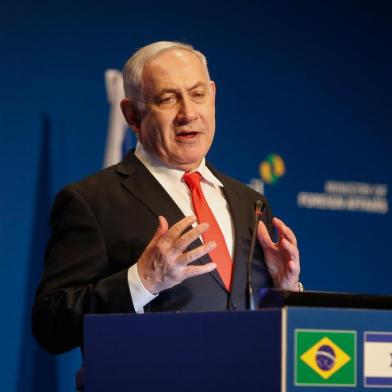  Israeli Prime Minister Benjamin Netanyahu speaks during the opening ceremony of the Brazilian Ministry Trade And Investment Promotion Agency in Jerusalem on December 15, 2019. (Photo by Gil COHEN-MAGEN / AFP)Editoria: FINLocal: JERUSALEMIndexador: GIL COHEN-MAGENSecao: economy (general)Fonte: AFPFotógrafo: STR<!-- NICAID(14359643) -->