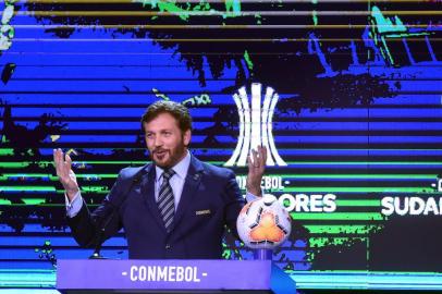  The president of the South American Football Confederation (Conmebol), Paraguayan Alejandro Dominguez, speaks during the Copa Libertadores and Copa Sudamericana draw at the Conmebol headquarters in Luque, Paraguay on December 17, 2019. (Photo by NORBERTO DUARTE / AFP)Editoria: SPOLocal: LuqueIndexador: NORBERTO DUARTESecao: soccerFonte: AFPFotógrafo: STR