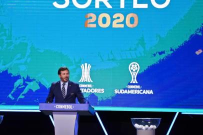  The president of the South American Football Confederation (Conmebol), Paraguayan Alejandro Dominguez, speaks during the Copa Libertadores and Copa Sudamericana draw at the Conmebol headquarters in Luque, Paraguay on December 17, 2019. (Photo by NORBERTO DUARTE / AFP)Editoria: SPOLocal: LuqueIndexador: NORBERTO DUARTESecao: soccerFonte: AFPFotógrafo: STR