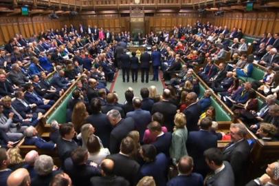 A video grab from footage broadcast by the UK Parliaments Parliamentary Recording Unit (PRU) shows tellers Conservative MP Stewart Andrew, Conservative MP Iain Steart, Labour MP Thangam Debbonaire, and Labour MP Jeff Smith giving the result of a vote on the European Union (Withdrawal Agreement) Bill, second reading, in the House of Commons in London on December 20, 2019. - Britains newly-elected parliament gave its initial backing to Prime Minister Boris Johnsons Brexit divorce deal on Friday. Following a thumping general election win for Johnsons Conservatives in last weeks snap general election -- called to clear the Brexit impasse -- MPs voted by 358 to 234 to clear the Withdrawal Agreement Bill through its first hurdle in the House of Commons. (Photo by HO / various sources / AFP) / RESTRICTED TO EDITORIAL USE - MANDATORY CREDIT  AFP PHOTO / UK PARLIAMENT  - NO USE FOR ENTERTAINMENT, SATIRICAL, MARKETING OR ADVERTISING CAMPAIGNS<!-- NICAID(14365957) -->