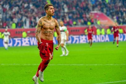  Liverpools Brazilian midfielder Roberto Firmino celebrates his goal during the 2019 FIFA Club World Cup Final football match between Englands Liverpool and Brazils Flamengo at the Khalifa International Stadium in the Qatari capital Doha on December 21, 2019. (Photo by Giuseppe CACACE / AFP)Editoria: SPOLocal: DohaIndexador: GIUSEPPE CACACESecao: soccerFonte: AFPFotógrafo: STF