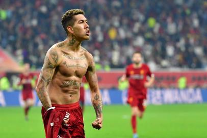  Liverpools Brazilian midfielder Roberto Firmino celebrates his goal during the 2019 FIFA Club World Cup Final football match between Englands Liverpool and Brazils Flamengo at the Khalifa International Stadium in the Qatari capital Doha on December 21, 2019. (Photo by Giuseppe CACACE / AFP)Editoria: SPOLocal: DohaIndexador: GIUSEPPE CACACESecao: soccerFonte: AFPFotógrafo: STF