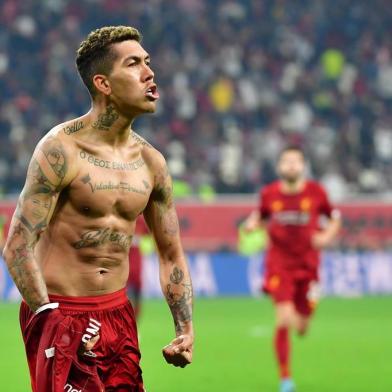  Liverpools Brazilian midfielder Roberto Firmino celebrates his goal during the 2019 FIFA Club World Cup Final football match between Englands Liverpool and Brazils Flamengo at the Khalifa International Stadium in the Qatari capital Doha on December 21, 2019. (Photo by Giuseppe CACACE / AFP)Editoria: SPOLocal: DohaIndexador: GIUSEPPE CACACESecao: soccerFonte: AFPFotógrafo: STF