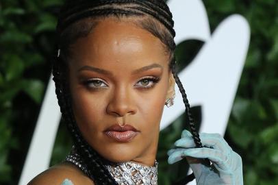 (FILES) In this file photo taken on December 2, 2019 Barbadian singer Rihanna poses on the red carpet upon arrival at The Fashion Awards 2019 in London - Attempting to define a decade in the world of entertainment is, at best, daunting.But hey, we are going to give it a try.Here are some of the key trends that emerged in the 2010s in television, film and music, from the explosion of scripted series to a new generation of divas whose empires transcend the concert stage:- Generation streaming. At the start of 2010, Spotify had less than one million subscribers to its music platform, Netflix had a bit more than 12 million, and streaming services were more of a curiosity than anything else.Ten years on, Spotify has 248 million users and Netflix has more than 158 million. Streaming is now the norm. (Photo by Isabel Infantes / AFP) / RESTRICTED TO EDITORIAL USE -  NO MARKETING NO ADVERTISING CAMPAIGNS<!-- NICAID(14369133) -->