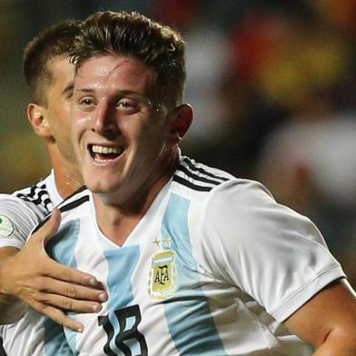 (FILES) In this file photo taken on February 04, 2019, Argentina's Adolfo Gaich (front) celebrates with teammates after scoring against Venezuela during their South American U-20 football match at El Teniente stadium in Rancagua, Chile. - Gaich will participate in the Under-23 South American Pre-Olympic Tournament taking place in the Colombian cities of Armenia, Bucaramanga and Pereira between January 18 and February 9, 2020. (Photo by CLAUDIO REYES / AFP)<!-- NICAID(14391244) -->