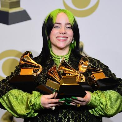 US singer-songwriter Billie Eilish poses in the press room with the awards for Album Of The Year, Record Of The Year, Best New Artist, Song Of The Year and Best Pop Vocal Album during the 62nd Annual Grammy Awards on January 26, 2020, in Los Angeles. (Photo by FREDERIC J. BROWN / AFP)<!-- NICAID(14399319) -->