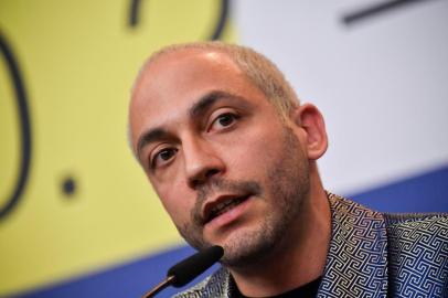 Brazilian director Caetano Gotardo attends a press conference for the film All the dead ones (Todos os mortos) screened in competition on February 23, 2020 at the 70th Berlinale film festival in Berlin. - The 11-day Berlinale celebrates its 70th anniversary and runs until March 1, 2020. (Photo by John MACDOUGALL / AFP)<!-- NICAID(14429621) -->