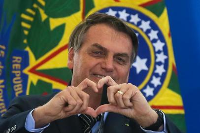 O presidente da RepÃºblica,Jair Bolsonaro, participa do lanÃ§amento da nova linha de crÃ©dito imobiliÃ¡rio com taxa fixa da Caixa EconÃ´mica Federal<!-- NICAID(14430277) -->