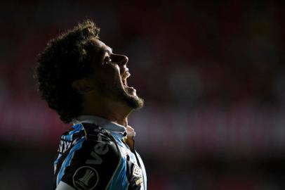  Brazils Gremio defender Victor Ferraz celebrates after scoring against Colombias America de Cali during their Copa Libertadores football match at Pascual Guerrero Stadium in Cali, Colombia, on March 3, 2020. (Photo by LUIS ROBAYO / AFP)Editoria: SPOLocal: CaliIndexador: LUIS ROBAYOSecao: soccerFonte: AFPFotógrafo: STF<!-- NICAID(14439137) -->