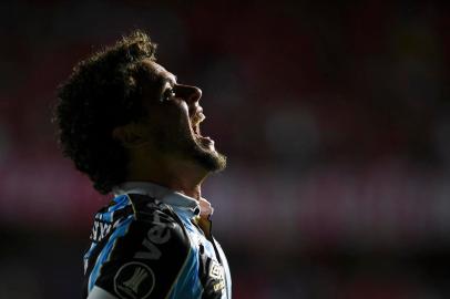  Brazils Gremio defender Victor Ferraz celebrates after scoring against Colombias America de Cali during their Copa Libertadores football match at Pascual Guerrero Stadium in Cali, Colombia, on March 3, 2020. (Photo by LUIS ROBAYO / AFP)Editoria: SPOLocal: CaliIndexador: LUIS ROBAYOSecao: soccerFonte: AFPFotógrafo: STF<!-- NICAID(14439135) -->