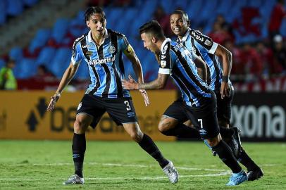  Brazils Gremio midfielder Matheus Henrique (C) celebrates his goal against Colombias America de Cali during their 2020 Copa Libertadores football match at Olimpico Pascual Guerrero Stadium, in Cali, Colombia, on March 3, 2020. (Photo by LUIS ROBAYO / AFP)Editoria: SPOLocal: CaliIndexador: LUIS ROBAYOSecao: soccerFonte: AFPFotógrafo: STF<!-- NICAID(14439195) -->