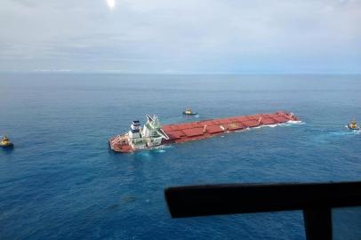 Handout photo released by the Brazilian Navy of South Korean ship MV Stellar Banner, loaded with mining ore, stranded 100 kilometres off the northeastern coast of Brazil, after leaving the Ponta de Madeira terminal in Sao Luis, Maranhao, on February 27, 2020. - After the ship ran into difficulties the crew was ordered to abandon it for their safety. MV Stellar Banner was built in 2016, and is operated by the South Korean company Polaris and hired by Brazilian Mining company Vale. (Photo by - / BRAZILIAN NAVY / AFP) / RESTRICTED TO EDITORIAL USE - MANDATORY CREDIT AFP PHOTO / BRAZILIAN NAVY - NO MARKETING NO ADVERTISING CAMPAIGNS - DISTRIBUTED AS A SERVICE TO CLIENTS<!-- NICAID(14440246) -->