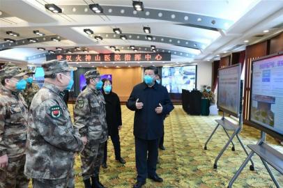  Chinese President Xi Jinping, also general secretary of the Communist Party of China Central Committee and chairman of the Central Military Commission, learns about the hospitals operations, treatment of patients, protection for medical workers and scientific research at the Huoshenshan Hospital in Wuhan, central Chinas Hubei Province, March 10, 2020. Xi Jinping on Tuesday arrived in Wuhan, the epicenter of the COVID-19 outbreak, for an inspection of the epidemic prevention and control work in Hubei Province and its capital city Wuhan. Xi visited and expressed regards to medical workers, military officers and soldiers, community workers, police officers, officials and volunteers who have been fighting the epidemic on the front line, as well as patients and residents during the inspection. (Xinhua/Xie Huanchi)<!-- NICAID(14445858) -->