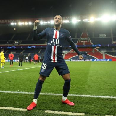  This handout photograph taken and released by the UEFA on March 11, 2020, shows  Paris Saint-Germains Brazilian forward Neymar celebrating after winning the   UEFA Champions League round-of-16 second leg football match between Paris Saint-Germain (PSG) and Borussia Dortmund at the Parc des Princes stadium in Paris. - The match is held behind closed doors due to the spread of COVID-19, the new coronavirus. (Photo by - / GETTY/UEFA / AFP) / RESTRICTED TO EDITORIAL USE - MANDATORY CREDIT AFP PHOTO / GETTY / UEFA - NO MARKETING NO ADVERTISING CAMPAIGNS - DISTRIBUTED AS A SERVICE TO CLIENTSEditoria: SPOLocal: ParisIndexador: -Secao: soccerFonte: GETTY/UEFAFotógrafo: Handout<!-- NICAID(14447984) -->